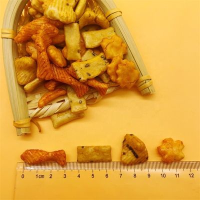 Αγορά Τα ιαπωνικά εξωτικά ψημένα τρόφιμα πρόχειρων φαγητών σιταριού έψησαν τις ασιατικές ζωηρόχρωμες κροτίδες ρυζιού μιγμάτων online manufacture